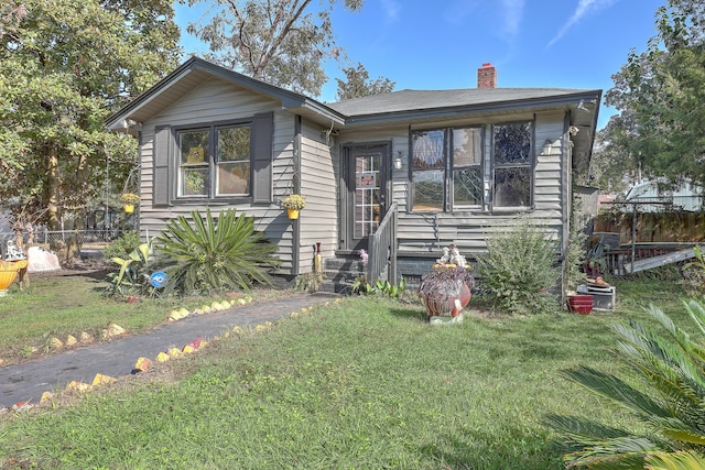 view of front of house with a front yard