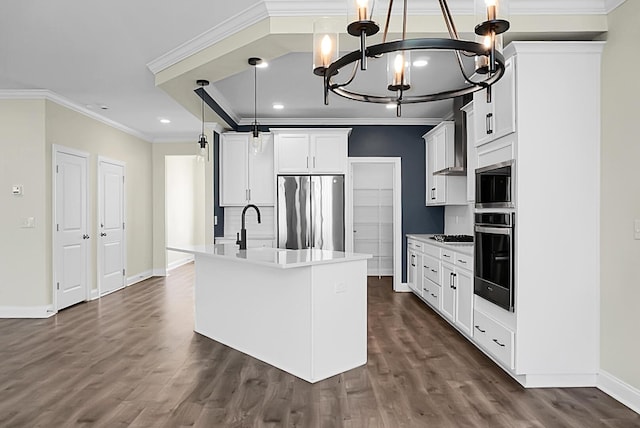 661 Black Pine Rd, Moncks Corner, SC 29461 - kitchen featuring appliances with stainless steel finishes, ornamental molding, a chandelier, baseboards, and dark wood finished floors
