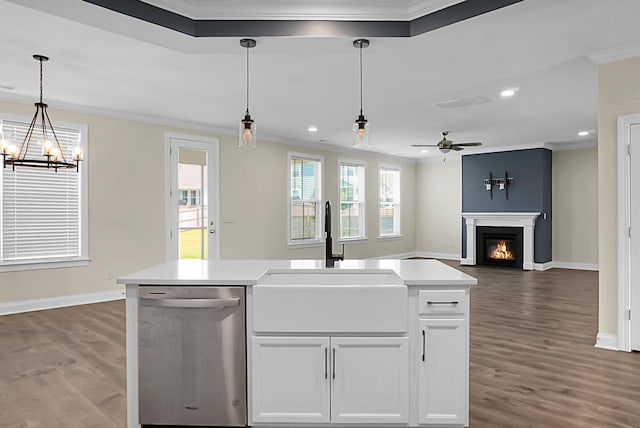 661 Black Pine Rd, Moncks Corner, SC 29461 - kitchen with dishwasher, a sink, crown molding, baseboards, and wood finished floors