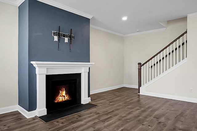 661 Black Pine Rd, Moncks Corner, SC 29461 - unfurnished living room with ornamental molding, recessed lighting, wood finished floors, a warm lit fireplace, and baseboards