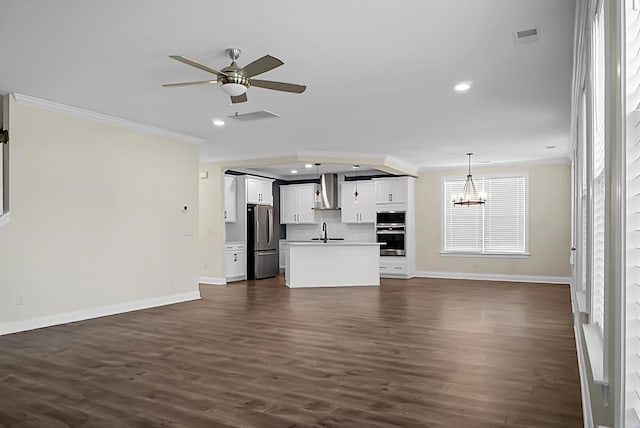 661 Black Pine Rd, Moncks Corner, SC 29461 - unfurnished living room with a sink, ornamental molding, baseboards, a chandelier, and dark wood-type flooring