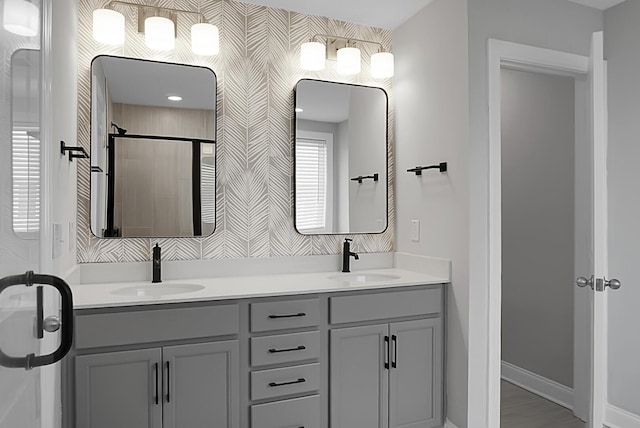 661 Black Pine Rd, Moncks Corner, SC 29461 - full bathroom with double vanity, a tile shower, and baseboards