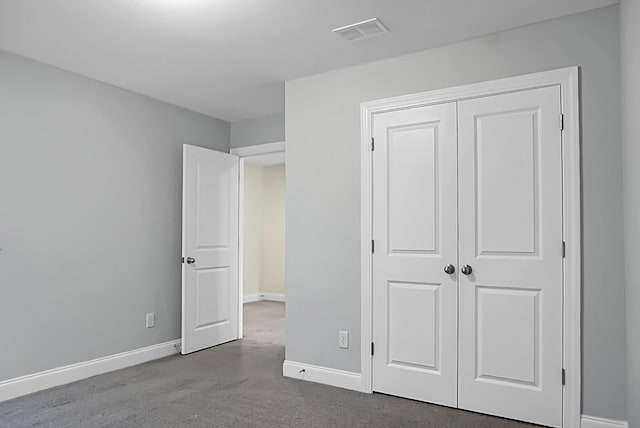 661 Black Pine Rd, Moncks Corner, SC 29461 - unfurnished bedroom with baseboards, a closet, and carpet flooring