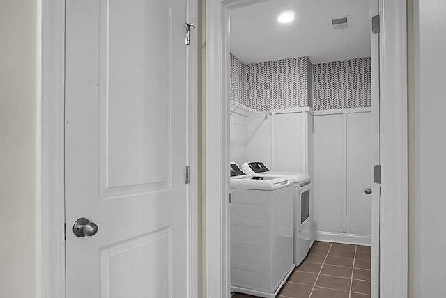 661 Black Pine Rd, Moncks Corner, SC 29461 - laundry room with washer and dryer and dark tile patterned floors