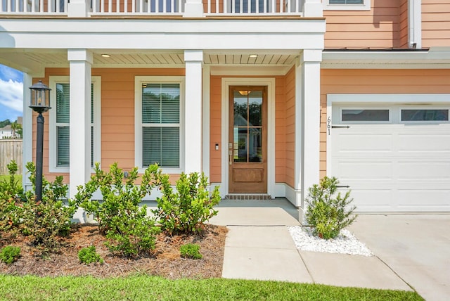 661 Black Pine Rd, Moncks Corner, SC 29461 - view of exterior entry featuring a balcony, an attached garage, and covered porch