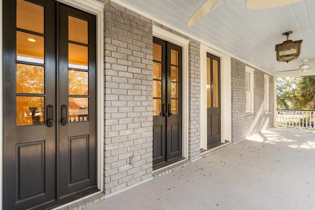 property entrance featuring french doors