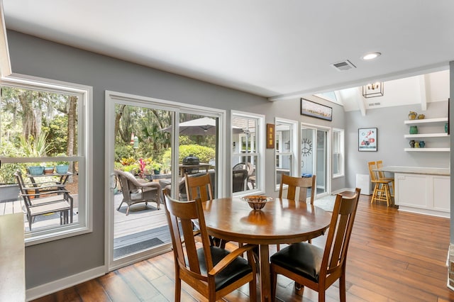 2500 The Bent Twig, Seabrook Island, SC 29455 - dining area with wood-type flooring, baseboards, recessed lighting, a chandelier, and french doors