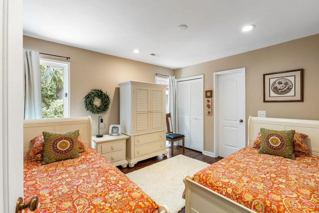 2500 The Bent Twig, Seabrook Island, SC 29455 - bedroom featuring dark wood-style flooring, recessed lighting, a closet, and baseboards