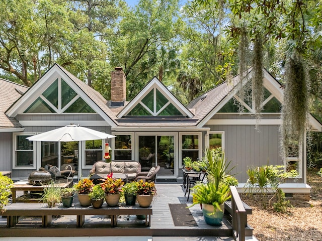 2500 The Bent Twig, Seabrook Island, SC 29455 - rear view of house featuring a deck, an outdoor hangout area, a chimney, and roof with shingles