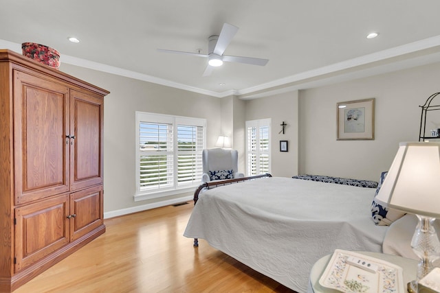 225 Seven Farms Dr Unit 307, Daniel Island, SC 29492 - bedroom with light wood-style flooring, crown molding, recessed lighting, and a ceiling fan