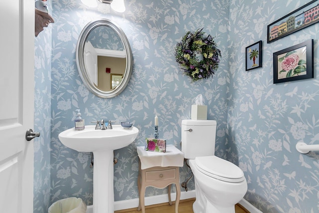 225 Seven Farms Dr Unit 307, Daniel Island, SC 29492 - half bath featuring wood finished floors and wallpapered walls