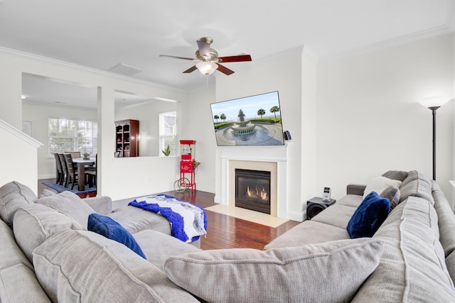 145 Woodbrook Way, Moncks Corner, SC 29461 - living area featuring wood finished floors, ceiling fan, crown molding, a fireplace with flush hearth, and baseboards