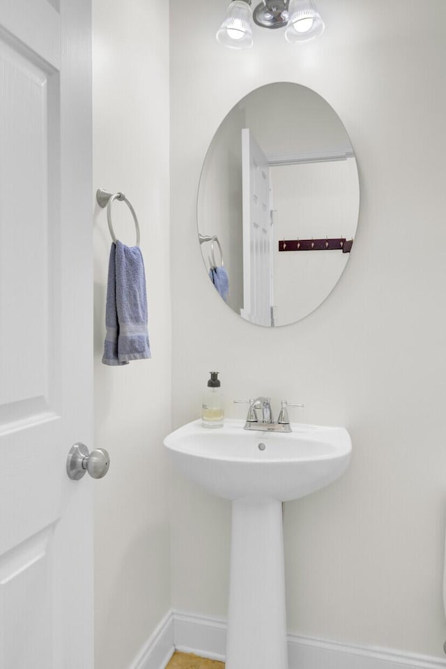 145 Woodbrook Way, Moncks Corner, SC 29461 - bathroom featuring baseboards and a sink