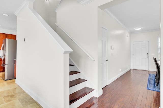 145 Woodbrook Way, Moncks Corner, SC 29461 - entryway with crown molding, stairway, baseboards, light wood-type flooring, and recessed lighting