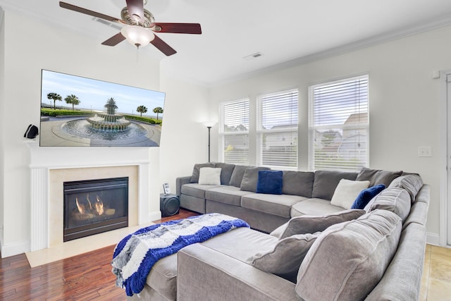 145 Woodbrook Way, Moncks Corner, SC 29461 - living room with ornamental molding, wood finished floors, ceiling fan, a fireplace, and baseboards