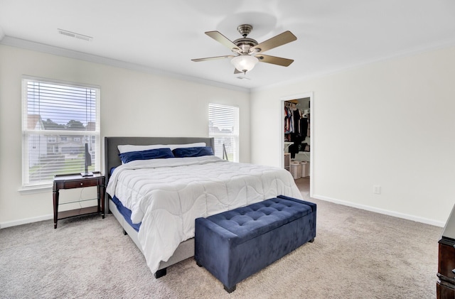 145 Woodbrook Way, Moncks Corner, SC 29461 - carpeted bedroom featuring ornamental molding, multiple windows, baseboards, a spacious closet, and a ceiling fan