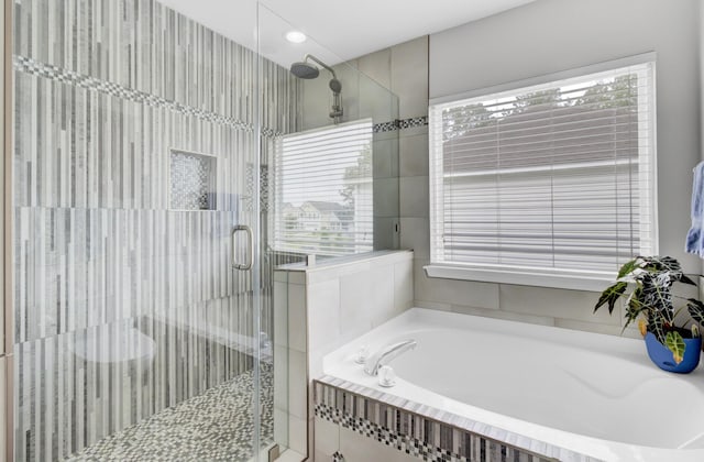 145 Woodbrook Way, Moncks Corner, SC 29461 - full bath featuring a garden tub, a stall shower, and healthy amount of natural light