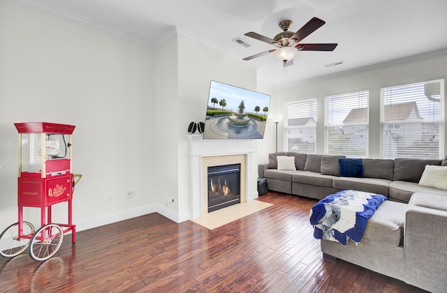145 Woodbrook Way, Moncks Corner, SC 29461 - living area featuring wood finished floors, a fireplace with flush hearth, ceiling fan, crown molding, and baseboards