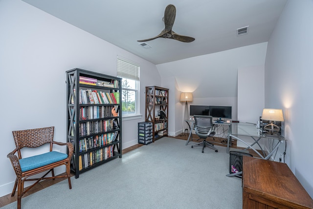 office area with ceiling fan, visible vents, carpet, and vaulted ceiling
