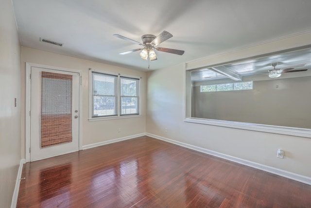 spare room featuring ceiling fan and wood-type flooring