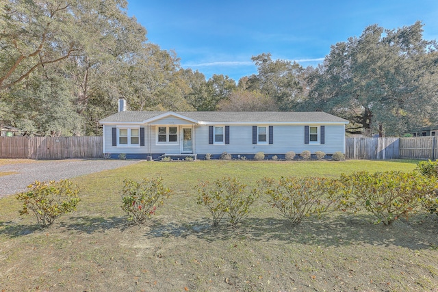 single story home featuring a front yard