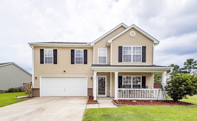 view of front property featuring a front lawn, covered porch, and a garage