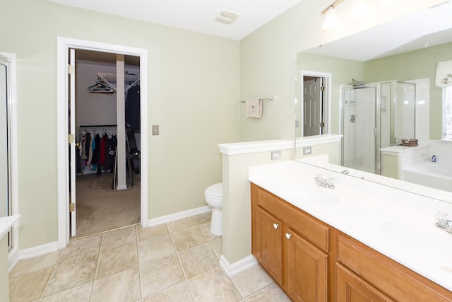 full bathroom with toilet, vanity, and shower with separate bathtub