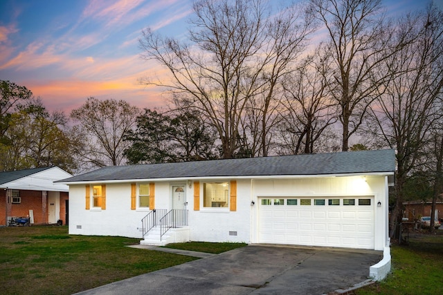 ranch-style home with brick siding, a front yard, a garage, crawl space, and driveway