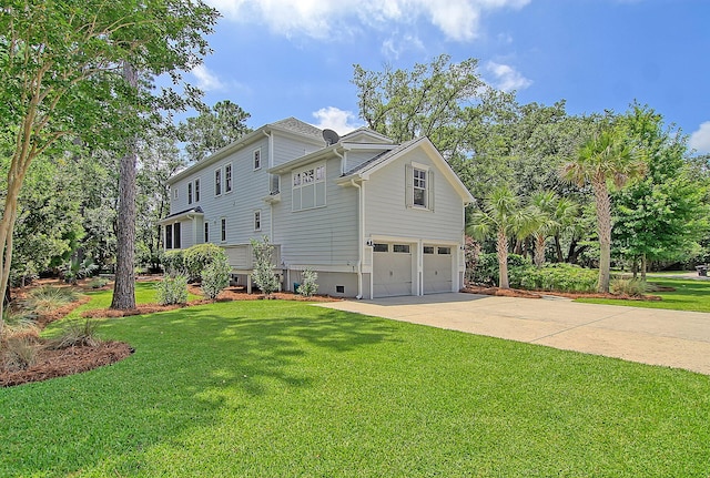 exterior space with a garage and a yard