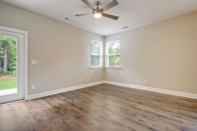 empty room with wood-type flooring and ceiling fan