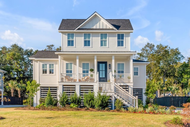 view of front facade with a porch and a front yard