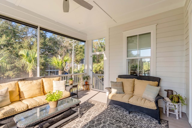 sunroom / solarium with ceiling fan