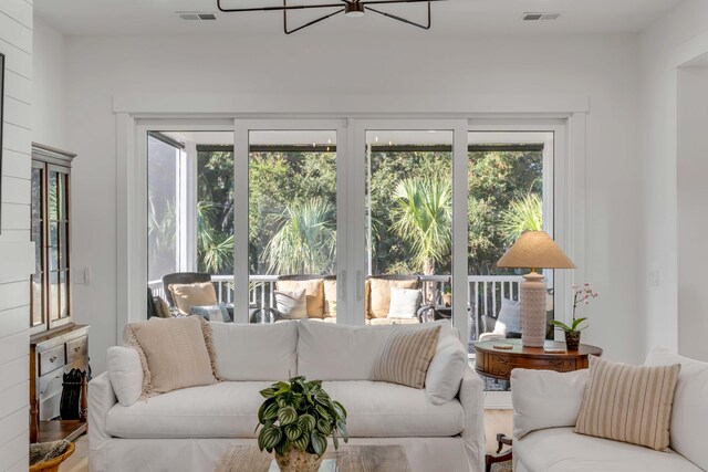 sunroom / solarium featuring plenty of natural light