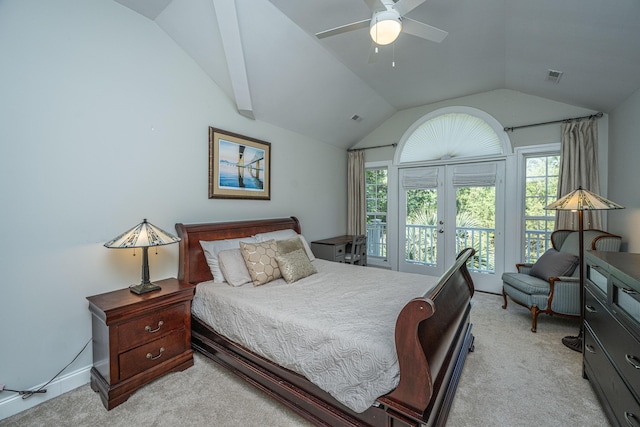bedroom with french doors, access to outside, multiple windows, vaulted ceiling, and light colored carpet