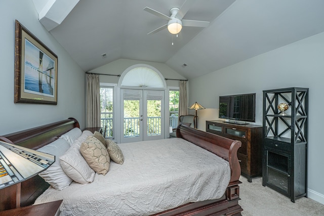 bedroom featuring vaulted ceiling, light colored carpet, french doors, a ceiling fan, and access to outside