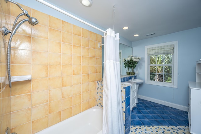 bathroom with recessed lighting, shower / tub combo with curtain, vanity, tile patterned floors, and baseboards