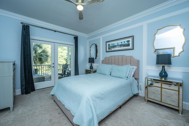 carpeted bedroom featuring french doors, access to outside, ornamental molding, baseboards, and a ceiling fan