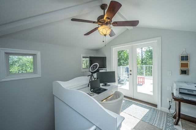 office with french doors, healthy amount of natural light, ceiling fan, and carpet floors