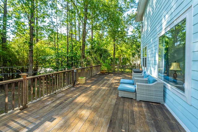 deck with view of wooded area