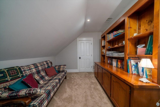 office space with visible vents, baseboards, lofted ceiling, light carpet, and recessed lighting