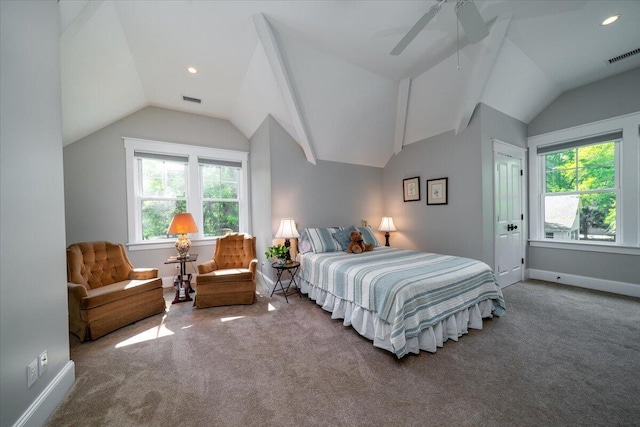 carpeted bedroom with ceiling fan, visible vents, and lofted ceiling