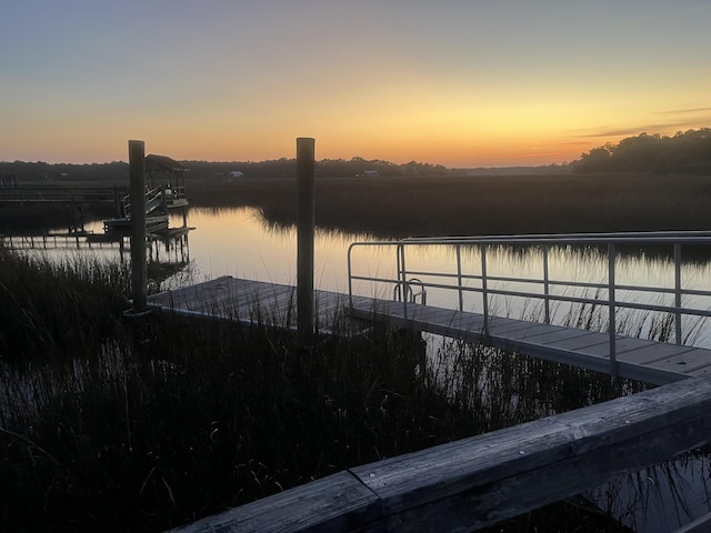 dock area featuring a water view