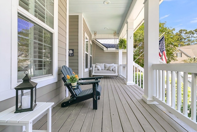 wooden terrace with covered porch