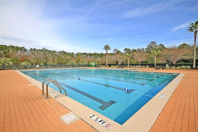 community pool with fence