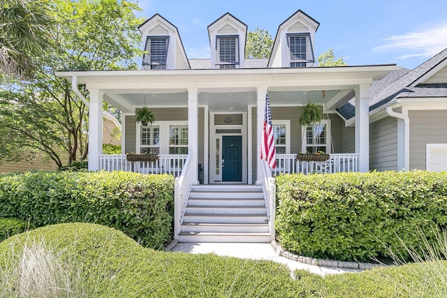 doorway to property featuring a porch