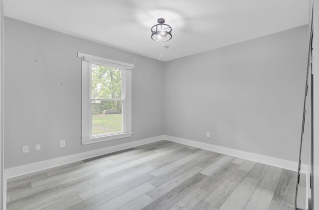 7674 Chippendale Rd, North Charleston, SC 29420 - unfurnished room with light wood-style flooring and baseboards