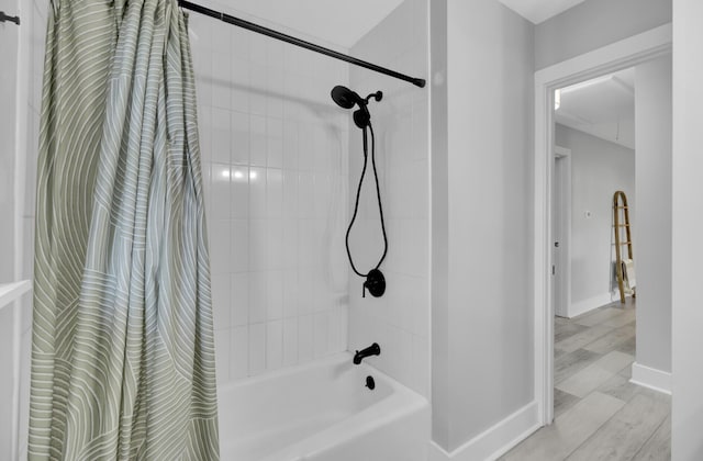 7674 Chippendale Rd, North Charleston, SC 29420 - full bath with shower / bathtub combination with curtain, baseboards, and wood finished floors