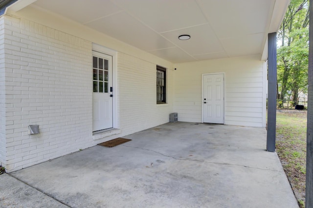 7674 Chippendale Rd, North Charleston, SC 29420 - view of patio featuring an attached carport