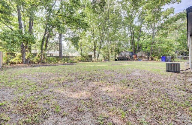7674 Chippendale Rd, North Charleston, SC 29420 - view of yard with central air condition unit