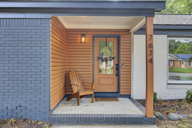 7674 Chippendale Rd, North Charleston, SC 29420 - doorway to property featuring brick siding
